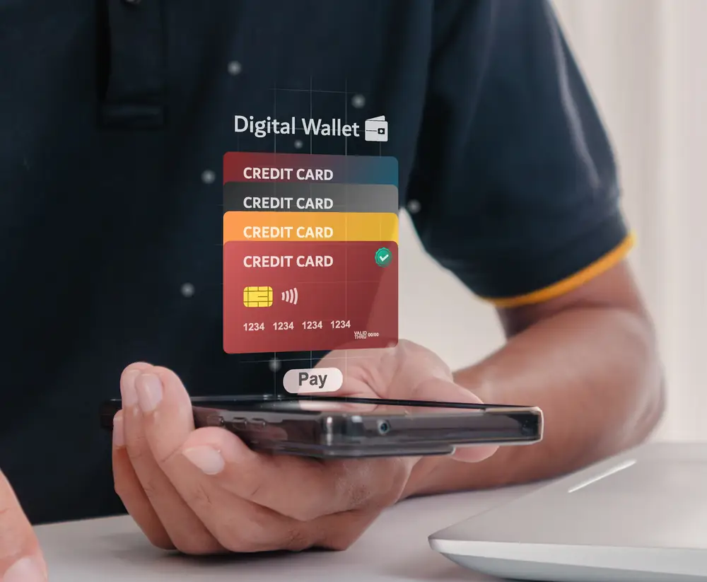 Digital wallet cards displayed above a phone